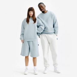 Bluza z okrągłym dekoltem unisex Elementals. Niebieskie bluzy męskie Decathlon, m, bez wzorów, z bawełny, bez kaptura. W wyprzedaży za 99.99 zł.