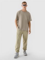 4F Spodnie dresowe oversize męskie - oliwkowe/khaki M. Brązowe spodnie sportowe męskie 4f, m, bez wzorów, z bawełny. W wyprzedaży za 79.99 zł.