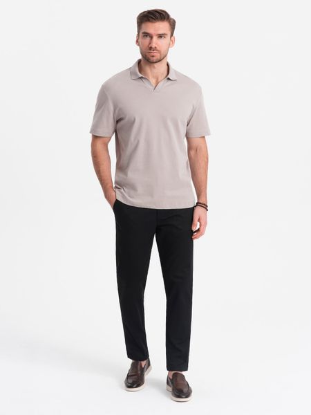 Spodnie męskie chino SLIM FIT z delikatną teksturą - czarne V5. Czarne spodnie materiałowe męskie Ombre Clothing, l, bez wzorów, z bawełny. W wyprzedaży za 199.99 zł.