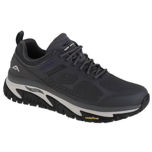 Buty do chodzenia męskie Skechers Arch Fit Road Walker. Szare buty sportowe męskie Skechers, z gumy, bez zapięcia, trekkingowe. Za 549.99 zł.