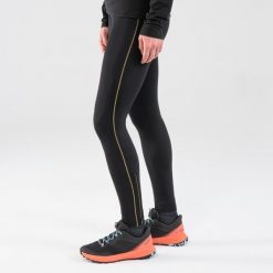 Legginsy do biegania w terenie damskie Kiprun Run 900. Czarne legginsy damskie EVADICT, l, bez wzorów, z materiału. Za 149.99 zł.