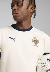 Męska koszulka treningowa Portugalia PUMA Sugared Almond Persian Blue Beige. Brązowe koszulki sportowe męskie Puma, m, bez wzorów, bez kołnierzyka, bez ramiączek, na fitness i siłownię. Za 236.30 zł.