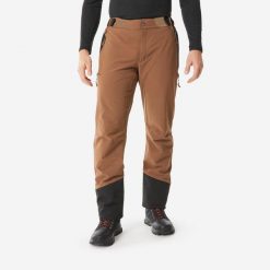 Spodnie turystyczne męskie Quechua SH500 Warm. Brązowe spodnie sportowe męskie QUECHUA, na zimę, l, bez wzorów, z materiału, trekkingowe. Za 249.99 zł.