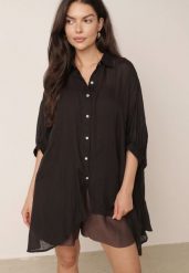 Czarna Zwiewna Koszula Letnia Oversize z Bawełny o Nietoperzowym Kroju Canomela. Czarne koszule damskie Born2be, na lato, l, bez wzorów, z bawełny, eleganckie, bez kołnierzyka, bez ramiączek. Za 139.99 zł.