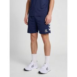 Szorty Hummel Core 2.0. Białe buty sportowe męskie Hummel, bez wzorów, na fitness i siłownię. Za 157.50 zł.