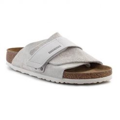 Klapki damskie Birkenstock Kyoto. Szare klapki damskie Birkenstock, bez wzorów, z materiału, bez obcasa. Za 754.95 zł.