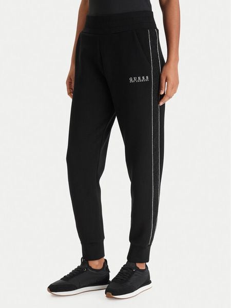 Guess Spodnie dresowe W6RB45 KBYE2 Czarny Regular Fit. Czarne spodnie dresowe damskie Guess, xs, z aplikacjami, z dresówki. Za 313.99 zł.