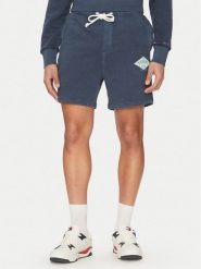 Tommy Jeans Szorty sportowe Varsity DM0DM20936 Granatowy Regular Fit. Niebieskie krótkie spodenki sportowe męskie Tommy Jeans, m, bez wzorów, z bawełny. Za 189.99 zł.