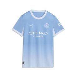 Damska koszulka domowa Manchester City 26/27 PUMA. Niebieskie t-shirty damskie Puma, l, bez wzorów, z materiału, bez kołnierzyka. Za 429.00 zł.