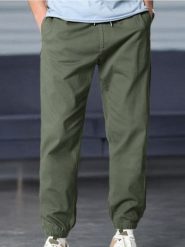 Spodnie jogger - zielony. Zielone spodnie materiałowe męskie Sinsay, m, bez wzorów. Za 49.99 zł.