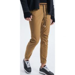 Spodnie slim jogger - Beżowy. Spodnie materiałowe męskie marki Cropp. Za 119.99 zł.