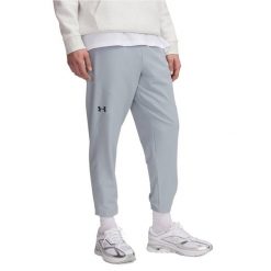Spodnie treningowe męskie Under Armour Unstoppable Tapered. Niebieskie buty sportowe męskie Under Armour, bez zapięcia, na fitness i siłownię. W wyprzedaży za 323.50 zł.