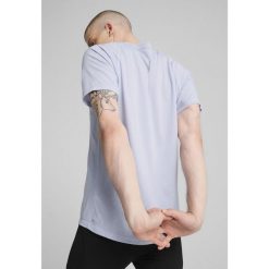 Męska koszulka do biegania VELOCITY Tri-Blend PUMA Cool Weather Blue. Niebieskie koszulki sportowe męskie Puma, m, bez wzorów, bez kołnierzyka, bez ramiączek, do biegania. W wyprzedaży za 104.00 zł.