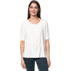 Koszulka w kolorze kremowym. T-shirty damskie Tom Tailor, z aplikacjami, z wiskozy, z okrągłym kołnierzem. W wyprzedaży za 65.95 zł.