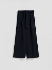 Spodnie z wiązaniem - granatowy. Niebieskie spodnie materiałowe damskie Reserved, bez wzorów, z tkaniny. Za 159.99 zł.