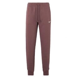 Spodnie sportowe damskie Nike FZ7626502. Brązowe spodnie dresowe damskie Nike, l, bez wzorów, z bawełny, na fitness i siłownię. Za 389.00 zł.