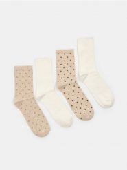 Skarpetki z bawełną 4 pack - kremowy. Białe skarpety damskie Sinsay, bez wzorów, z bawełny. Za 15.99 zł.