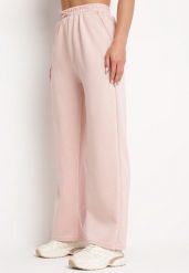 Jasnoróżowe Klasyczne Szerokie Spodnie z Wysokim Stanem i Gumką w Pasie Lortia. Czerwone spodnie sportowe damskie Born2be, l, bez wzorów, z jeansu. Za 39.99 zł.