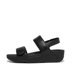 Damskie sandały z regulowanym skórzanym paskiem z tyłu FitFlop Lulu. Czarne sandały damskie Flip Flop, bez wzorów, ze skóry, bez obcasa, bez zapięcia. Za 509.00 zł.