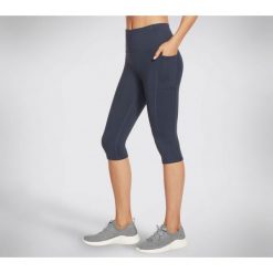 Rajstopy damskie Skechers GO WALK High Waisted Capri. Niebieskie legginsy damskie Skechers, bez wzorów, z nylonu, na fitness i siłownię. Za 390.00 zł.