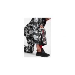 Spodnie narciarskie męskie SPMN251A - multikolor allover. Spodnie snowboardowe męskie marki WED'ZE. Za 399.99 zł.