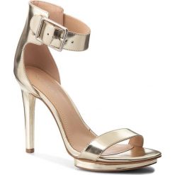 Sandały CALVIN KLEIN - Vivian N11928 Light Gold. Klapki damskie marki Calvin Klein. W wyprzedaży za 459.00 zł.