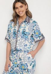 Niebieska Koszula z Wiskozy w Kwiatowy Wzór Milineira. Niebieskie bluzki damskie Born2be, l, bez wzorów, z jeansu, eleganckie, bez kołnierzyka, bez ramiączek. Za 79.99 zł.