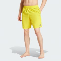 Szorty do pływania Solid CLX Classic-Length. Czarne szorty męskie Adidas, l, bez wzorów, z materiału, klasyczne. Za 114.40 zł.