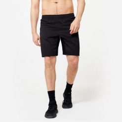 Spodenki fitness cardio męskie Domyos. Czarne krótkie spodenki sportowe męskie DOMYOS, m, bez wzorów, z elastanu, na fitness i siłownię. Za 49.99 zł.