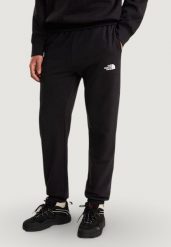 Spodnie Mężczyzna THE NORTH FACE M SIMPLE DOME LIGHT REGULAR TAPERED JOGG. Czarne spodnie sportowe męskie The North Face, m, bez wzorów, z bawełny, na fitness i siłownię. Za 321.70 zł.