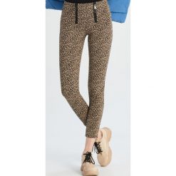 Wzorzyste tregginsy - Beżowy. Brązowe legginsy damskie Sinsay, l, bez wzorów. W wyprzedaży za 19.99 zł.