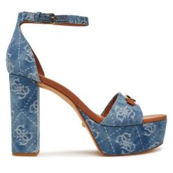 Sandały Guess. Niebieskie sandały damskie Guess, z aplikacjami, bez obcasa, na słupku, bez zapięcia. Za 599.99 zł.