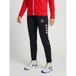 Damskie spodnie dresowe Hummel Core 2.0 Woven. Białe obuwie sportowe damskie Hummel, bez wzorów, z dresówki, na fitness i siłownię. Za 270.50 zł.