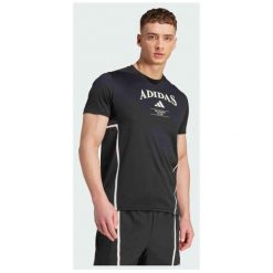 Koszulka męska adidas Designed for Training Legacy Heritage Tee. Czarne koszulki sportowe męskie Adidas, m, bez wzorów, z materiału, bez kołnierzyka, bez ramiączek, na fitness i siłownię, climacool (adidas). Za 157.99 zł.