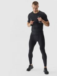 4F Legginsy treningowe ze średnim stanem męskie - czarne 3XL. Czarne legginsy sportowe męskie 4f, l, bez wzorów, z dzianiny, na fitness i siłownię. W wyprzedaży za 99.99 zł.