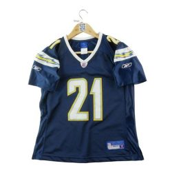 Second life - Koszulka damska Reebok NFL San Diego Chargers 21 - Jak nowy. Niebieskie koszulki sportowe damskie Reebok, m, bez wzorów, z jeansu, bez kołnierzyka, bez ramiączek, do piłki nożnej. Za 127.76 zł.