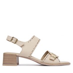 Sandały Caprice. Białe sandały damskie Caprice, bez wzorów, bez obcasa, na słupku, bez zapięcia. Za 339.99 zł.