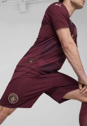 Męskie szorty Manchester City 24/25 PUMA Dark Jasper Red. Czerwone szorty męskie Puma, na jesień, l, bez wzorów, z żakardem, klasyczne. Za 191.20 zł.