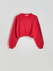 Krótka bluza ze ściągaczem - czerwony. Czerwone bluzy damskie Reserved, l, bez wzorów, z bawełny, bez kaptura. W wyprzedaży za 49.99 zł.
