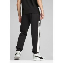 Męskie spodnie dresowe Around The Block PUMA Black. Czarne spodnie sportowe męskie Puma, m, bez wzorów, z dresówki, do biegania. W wyprzedaży za 104.00 zł.