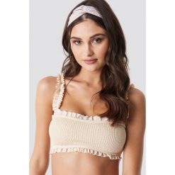 Camille Botten x NA-KD Smocked Bandeau Bikini Top - White. Bikini damskie marki Camille Botten x NA-KD. Za 141.95 zł.