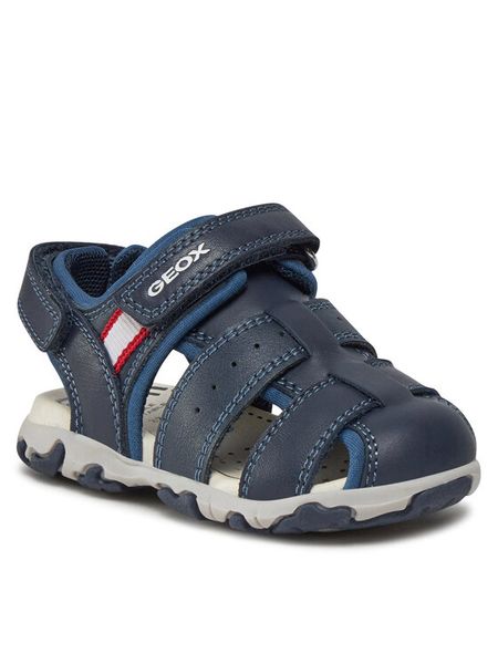 Geox Sandały B Sandal Flaffee Boy B4559B 08515 C4002 M Granatowy. Niebieskie sandały chłopięce Geox, ze skóry, bez zapięcia. Za 129.99 zł.