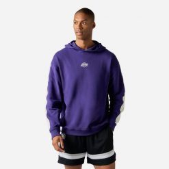 Bluza z kapturem do koszykówki unisex Tarmak NBA Lakers. Fioletowe bluzy sportowe damskie KIPSTA, m, bez wzorów, z bawełny, z kapturem, na fitness i siłownię. Za 149.99 zł.