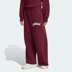 Damskie spodnie adidas z 3 paskami. Czerwone spodnie materiałowe damskie Adidas, xs, bez wzorów, z bawełny. Za 239.00 zł.