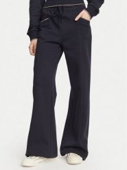 Guess Spodnie dresowe W6YB31 K5319 Granatowy Wide Leg. Niebieskie spodnie dresowe damskie Guess, xs, z aplikacjami, z bawełny. Za 434.99 zł.