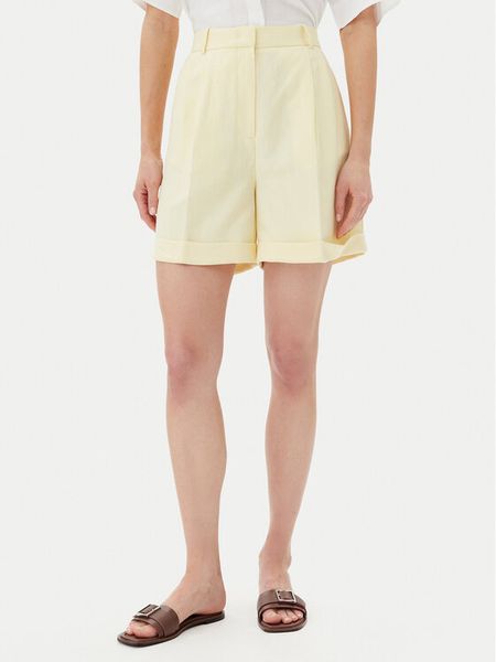 Tommy Hilfiger Szorty materiałowe WW0WW44767 Żółty Regular Fit. Żółte szorty damskie Tommy Hilfiger, bez wzorów, z materiału. Za 289.99 zł.