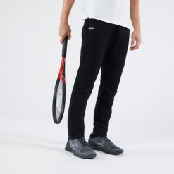 Spodnie do tenisa męskie Artengo Soft. Niebieskie spodnie sportowe męskie ARTENGO, na zimę, m, bez wzorów, z bawełny, tenisowe. Za 119.99 zł.