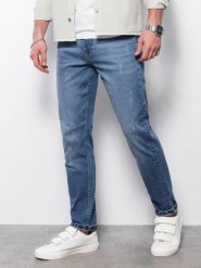 Spodnie męskie jeansowe z przetarciami REGULAR FIT - niebieskie V3. Niebieskie spodnie materiałowe męskie Ombre Clothing, m, bez wzorów, z bawełny. W wyprzedaży za 69.99 zł.