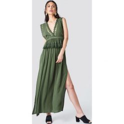 Trendyol Sukienka maxi z rozcięciami - Green. Zielone sukienki damskie Trendyol, z koronki, z dekoltem na plecach. Za 141.95 zł.