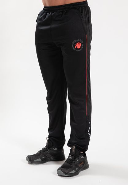 Broxton Track Spodnie - Czarny. Czarne spodnie sportowe męskie GORILLA WEAR, l, bez wzorów, z poliesteru, na fitness i siłownię. Za 244.00 zł.
